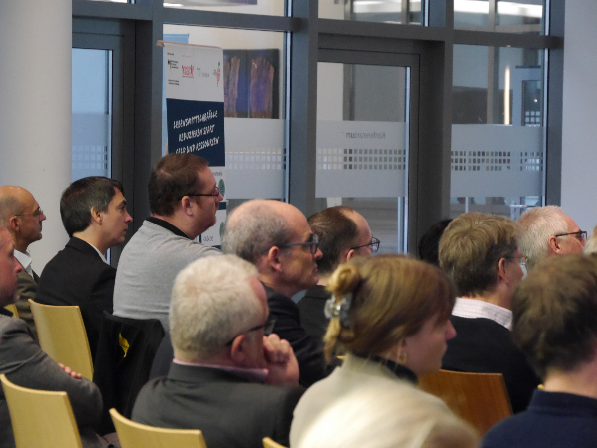 Zuhörende im Saal